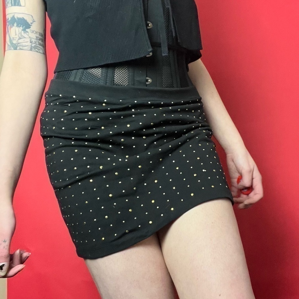 Black mini skirt with silver and gold studs  💛🖤​​​​​​​​​​​​​​​​​​​​​